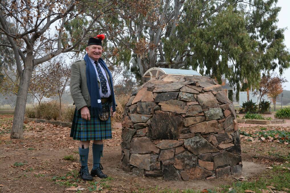 MEMORIAL: Aberdeen Highland Games president Charles Cooke inspects the memorial cairn at Taylor Park on Friday ahead of next Saturday's event. 