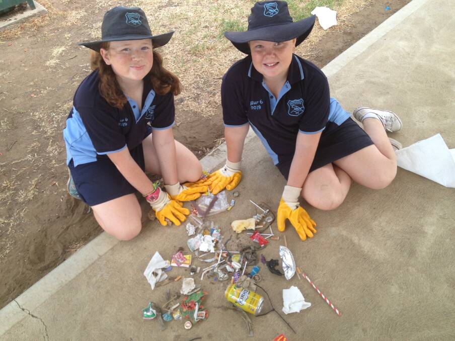 HELPING OUT: Eden Ferguson and Sophie Luscombe showed us how its done at the 2019 School Clean Up Australia Day in Murrurundi.