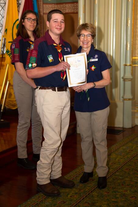 PROUD MOMENT: Liam Barnes from the 1st Scone Scout Group recieves his Queen's Scout Award from the Governor of NSW, Margaret Beazley.
