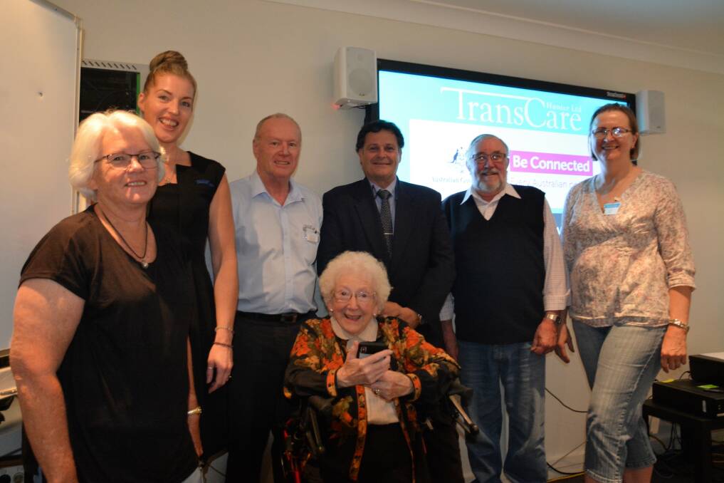 GET CONNECTED: TransCare clients, volunteers and staff with Upper Hunter Shire Council mayor Wayne Bedgood at the launch on Monday. 