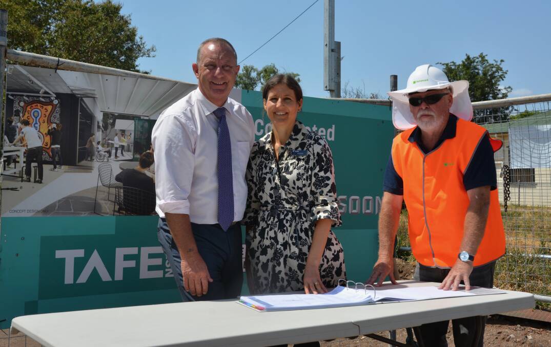 BROADER OPPORTUNITIES: Member for the Upper Hunter Michael Johnsen and Regional General Manager for TAFE NSW's North Region Susie George looking over plans for the new Scone TAFE on Thursday morning.