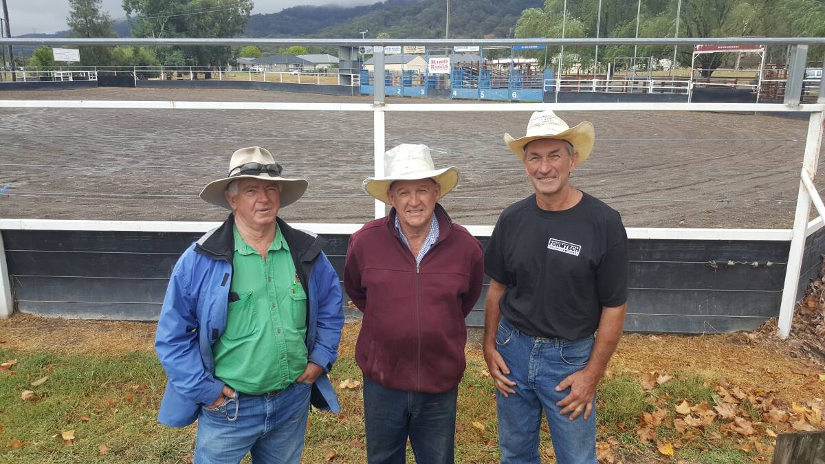 LET IT REIGN: Some of the hard working volunteers, Doug McIntosh, Bob Paton and Dale Burchfield were pegging out spaces for the 50 caravans booked in for the King of the Ranges festival this weekend.