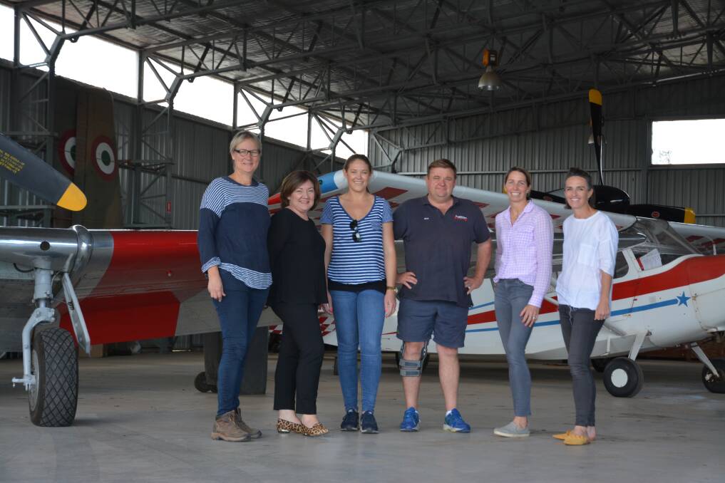 Event caterer Merv McRobert from The Hunted Gourmet, WTAW chair Jane Callinan, event manager Geraldine Moses from The Event Storeroom and Pay's Air Service's Ross Pay with ball coordinators Charlotte Parry-Okeden and Polly Yuille inspect the site for next month's WTAW Rainbow Ball.