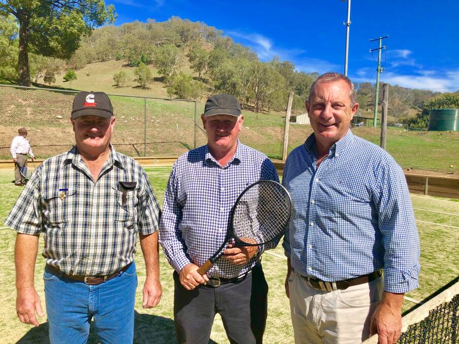 ACED: President of the Moonan Brook Public Reserve Terry Teague, Upper Hunter Shire Council Deputy Mayor Maurice Collison and Member for Upper Hunter Michael Johnsen at the newly resurfaced Moonan Brook tennis courts on Sunday.