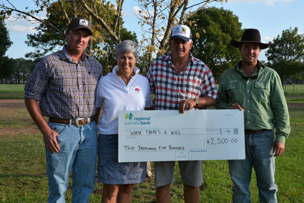 GENEROSITY: Rouchel Dog Trial representatives Nick Clydsdale and Wade Miles with Pauline and Hilton Carrigan on Tuesday. 
