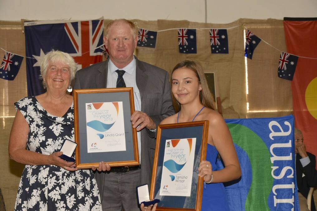 CITIZEN OF THE YEAR: The Upper Hunter Shire 2018 Australia Day Citizen and Young Citizen of the Year, Linda Gant and Tarnisha Winsor, receive their awards from Deputy Mayor Maurice Collison.