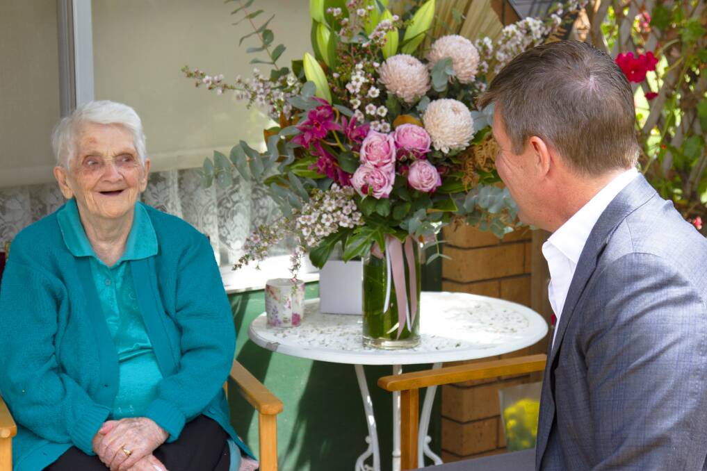 HUGE MILESTONE: 103 year old Scone resident chats with former NSW Premier and new HammondCare CEO Mike Baird. Photo: Supplied 
