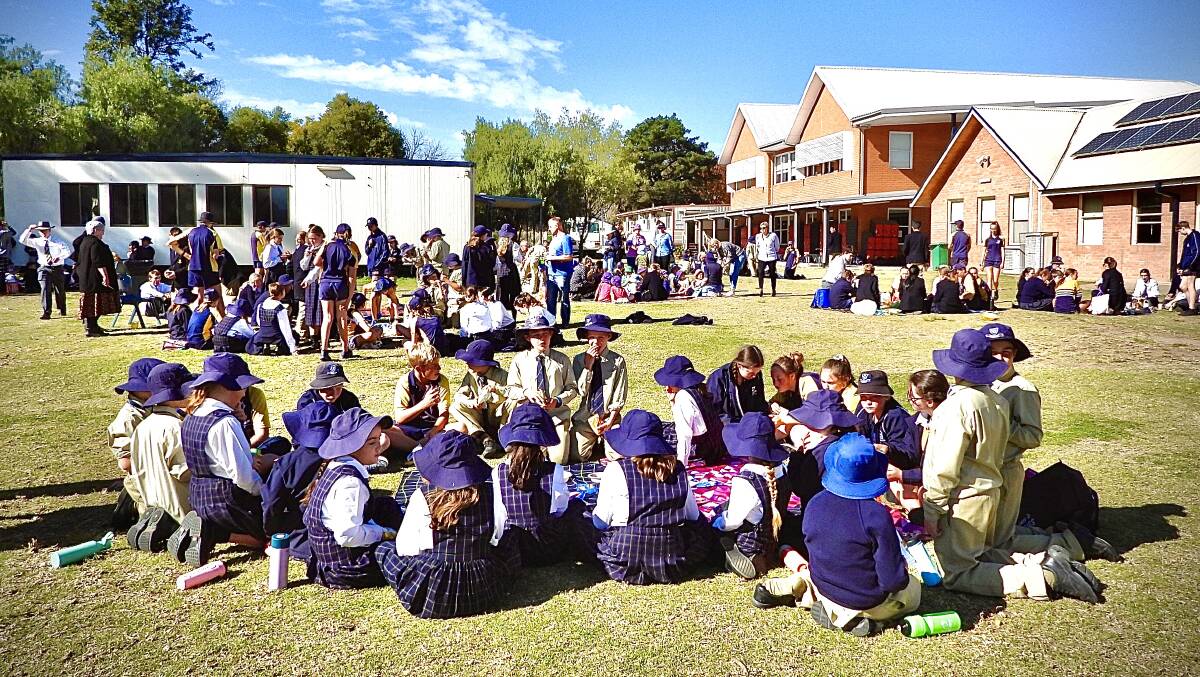 Students, teachers and staff gathered on picnic rugs and shared a picnic provided by Scone Grammar School's secondary students. 