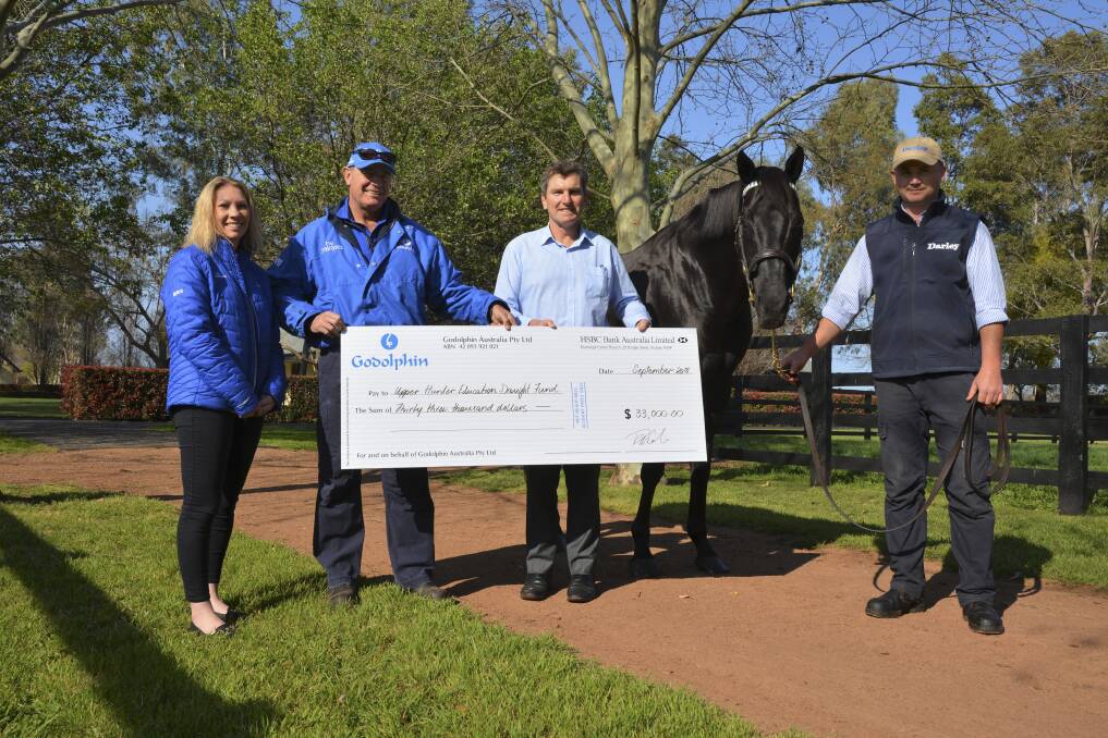 SUPPORTING RURAL YOUTH: Godolphin Flying Start Australia coordinator Tayla Gilmore, Godolphin Kelvinside stud manager Barley Ward-Thomas and Upper Hunter Education Fund president Andrew White with Champion Sire Lonhro and Godolphin stud hand manager Yev Kovalor.