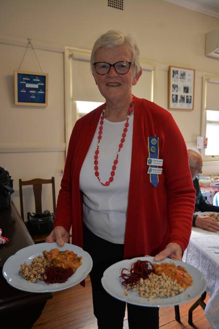 LUNCH IS SERVED: Scone Country Women’s Association secretary Carolyn Carter serving Polish dishes at their International Day Luncheon.