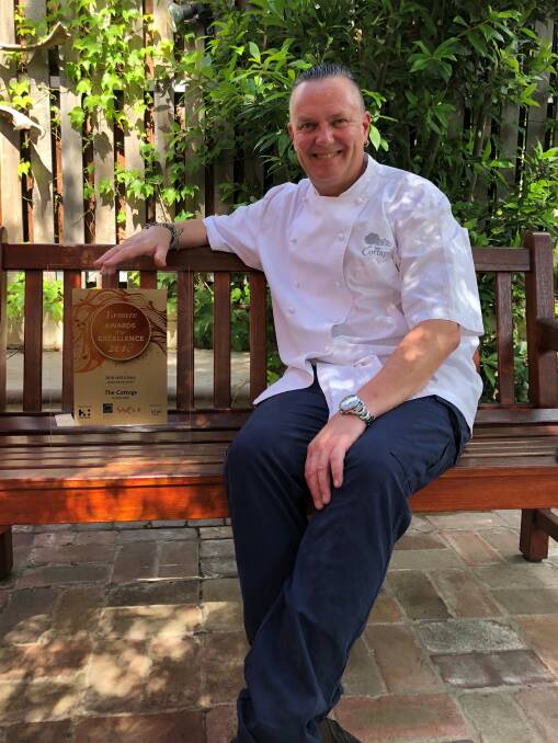 The Cottage business owner and chef Colin Selwood with the bronze gong for Best Steak Restaurant in Australia on Monday. 