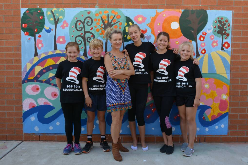 UNITED THROUGH ARTS: Mia Grabham, Andrew Crowther, Hannah Gatwood, Kristen Martin and Clare Wilkinson with Australian stage and television singer-actress Rachael Beck.