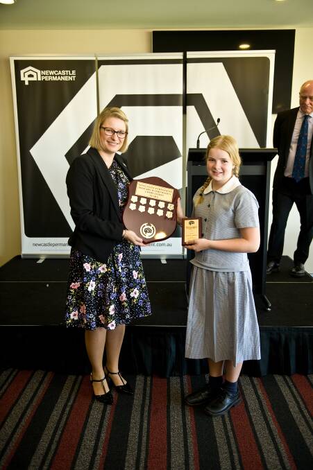 TOP MARKS: Scone Grammar School Year 6 student Georgina Kimpton accepting her award on Wednesday.
