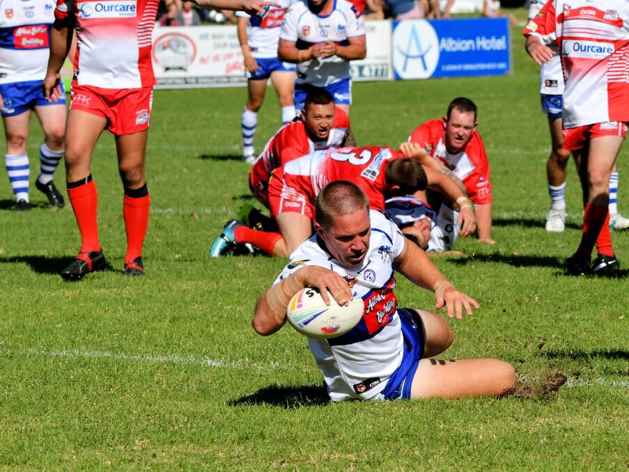 First Grade - Daniel Ritter marking his return after 12 months off with a try. Photo: David Casson