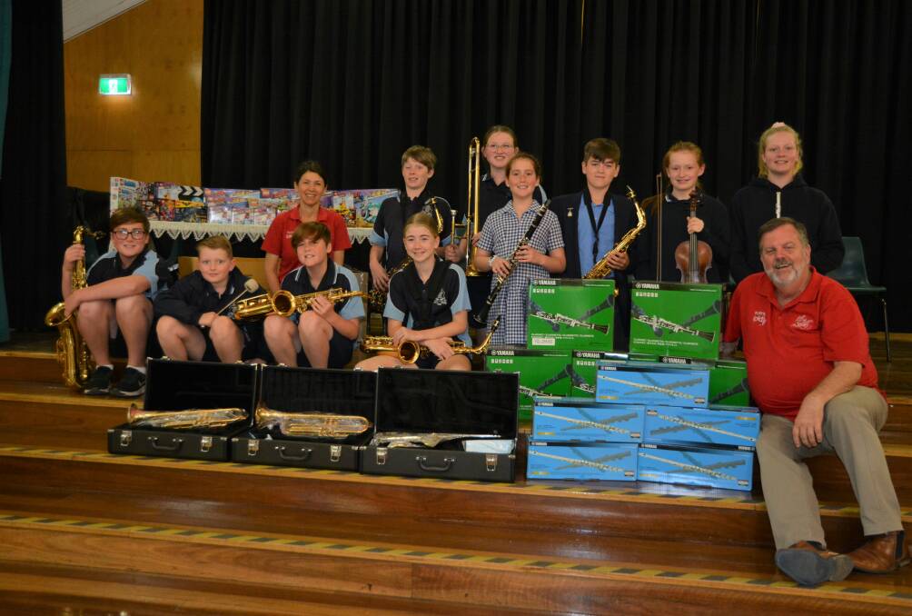 MUSICAL BOOST: Rural Aid's Gift of Music founders Wayne and Robyn Thomson presented students at Scone Public School with a range of musical instruments on Tuesday. 