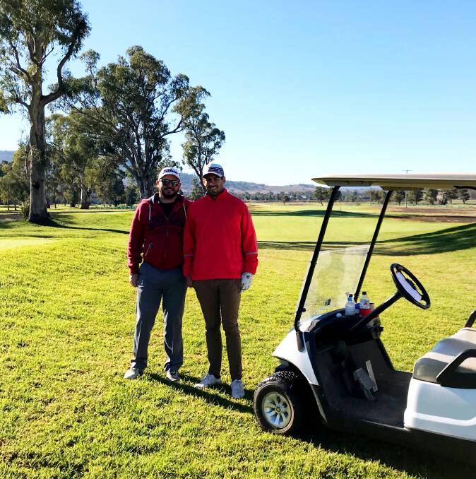 Wayne Hedley and Tim Smith bonding on a frosty Saturday on Scone Golf Course. 