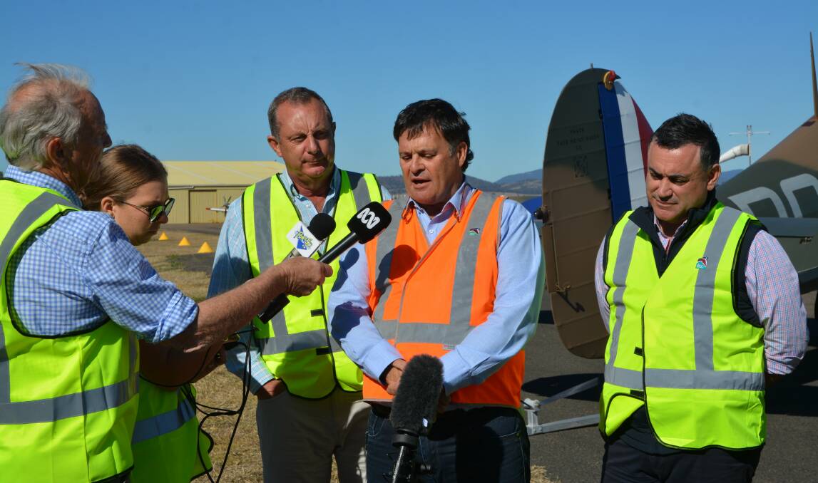 AIRPORT LANDS FUNDS: Upper Hunter MP Michael Johnsen alongside Upper Hunter Shire Mayor Wayne Bedggood and Deputy Premier and Minister for Regional NSW John Barilaro at Scone Regional Airport on Wednesday. 
