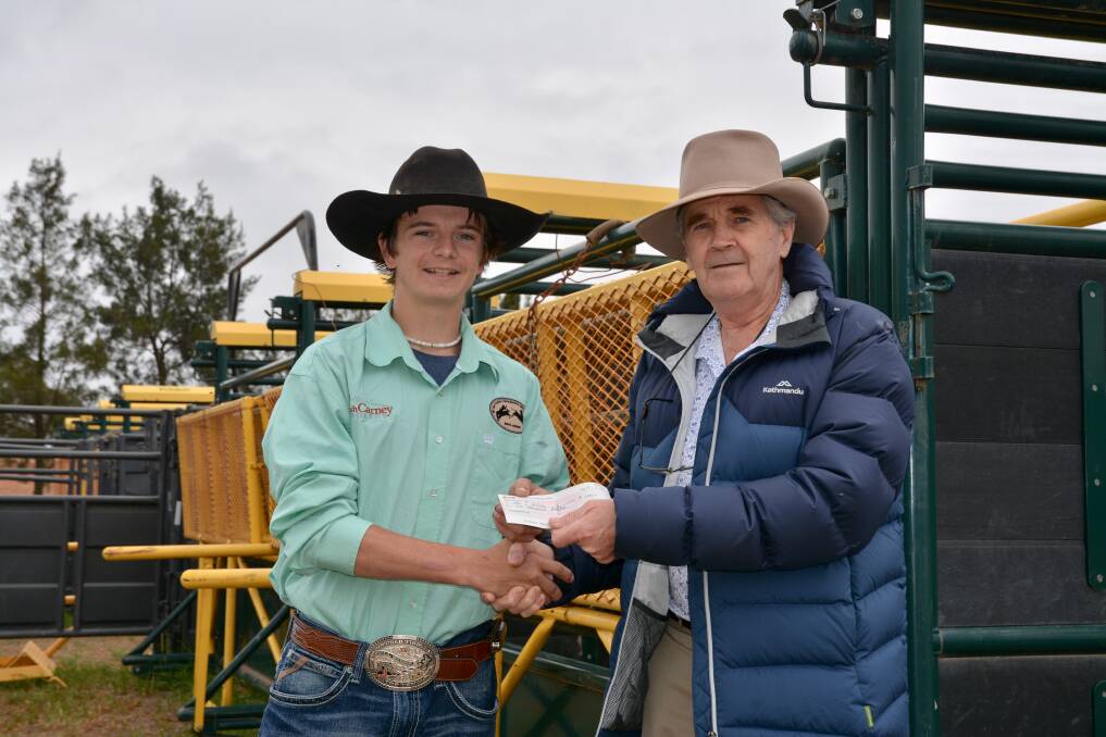 HELPING HAND: Scone bull rider Chris Wilson receives $1000 in sponsorship from family friend Neville McGuckin to help him on his bull riding adventure. 