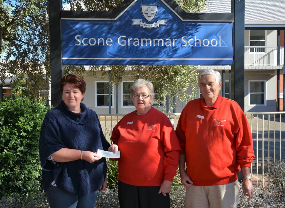 THANKFUL: Scone Grammar School P&F Treasurer Erryn Day hands over a cheque for $500 to the Westpac Rescue Helicopter Service Scone Support Group's Ann and Barry Martin.
