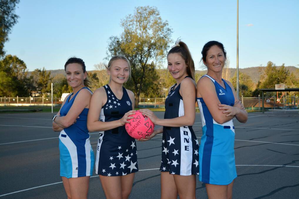 MOTHER DAUGHTER DUO: Mothers and coaches Maree Hedley (left) and Danielle Brown (right) with 14s representative players (centre) Lara Hedley and Tyla Brown.