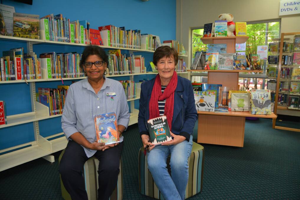 SPOOKY STORIES: Upper Hunter Shire Library coordinator Elizabeth Walter and Scone author Paula Stevenson at Scone Library on Thursday. 