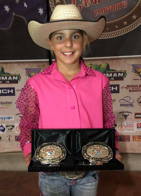 DOUBLE TITLES: Blandford's Sophie Edmonds holding her national title buckles. 