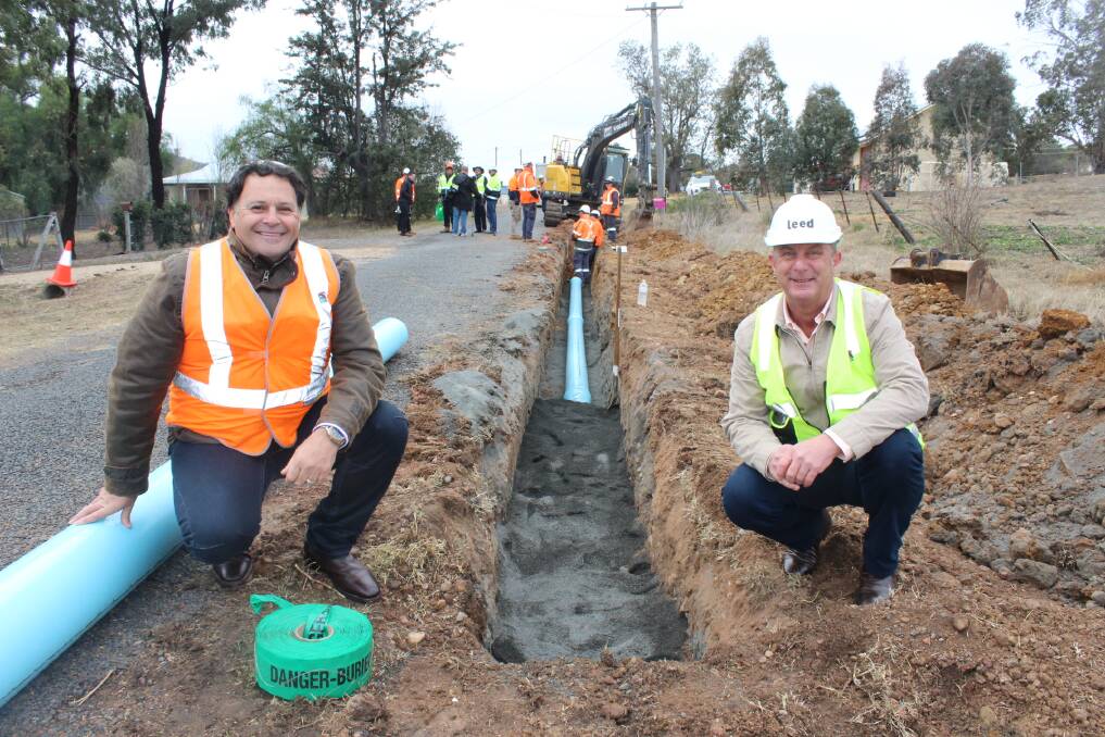 MILESTONE: Upper Hunter Shire Council Mayor Wayne Bedggood and Upper Hunter MP Michael Johnsen attended the laying of the first pipes for the crucial Scone to Murrurundi pipeline early Monday morning. 