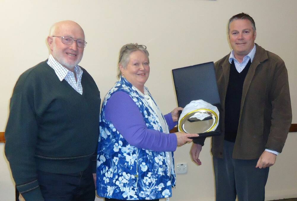 Merriwa's Lenore Taylor being presented with the prestigious Pam Power Award by former Upper Hunter Shire Council General Manager Waid Crocket and Cr Ron Campbell in 2015. Picture: Merriwa Festival of the Fleeces