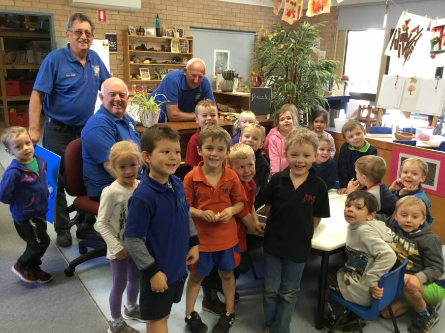 CONNECTIONS: The Scone & District Preschool students faces light up during a visit from the gentlemen at the Men's Shed. Picture: Supplied