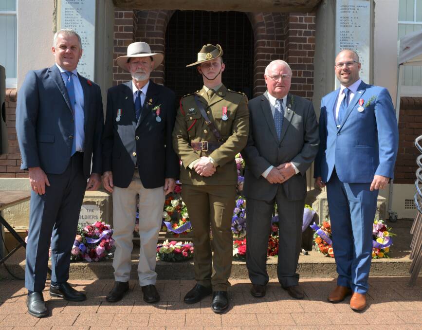 ANZAC DAY SPIRIT: Upper Hunter Shire Council general manager Steve McDonald, Scone RSL sub-branch member George Clementson, Captain Harry Wagner, Singleton School of Infantry, Scone RSL Sub-Branch president Val Quinell and James Burns.