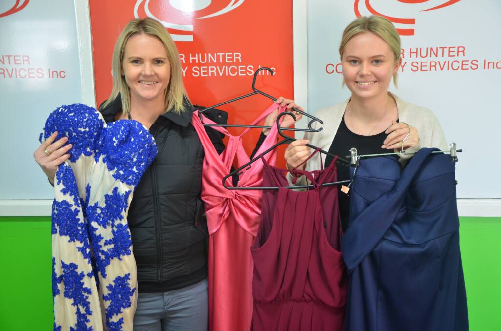DRESSED UP: Upper Hunter Community Service's Bec Eveleigh and Jessica Dallah are imploring people to donate their formal wear.