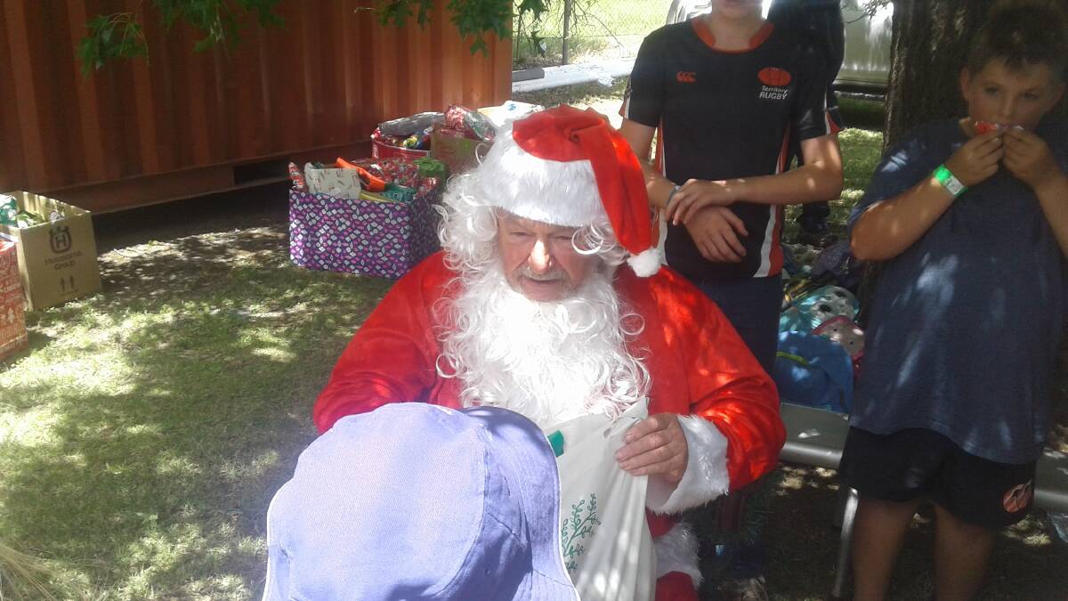 EARLY PRESENT: Santa was a surprise guest at the Christmas party themed cricket day at the weekend.
