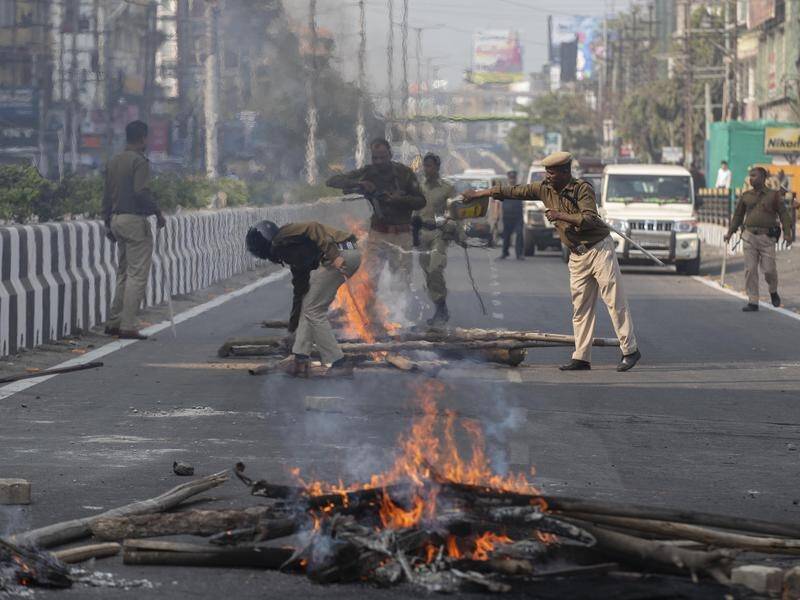 Protesters gathered in parts of Guwahati, Assam's largest city, started fires and threw stones.
