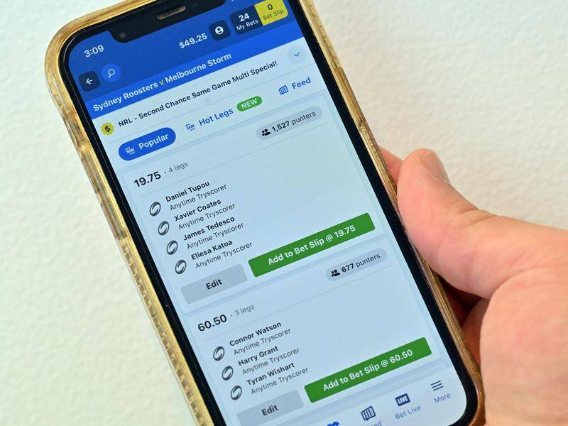 Gambling companies will have to pay into a campaign spruiking the exclusion register BetStop. Photo: Mick Tsikas/AAP PHOTOS