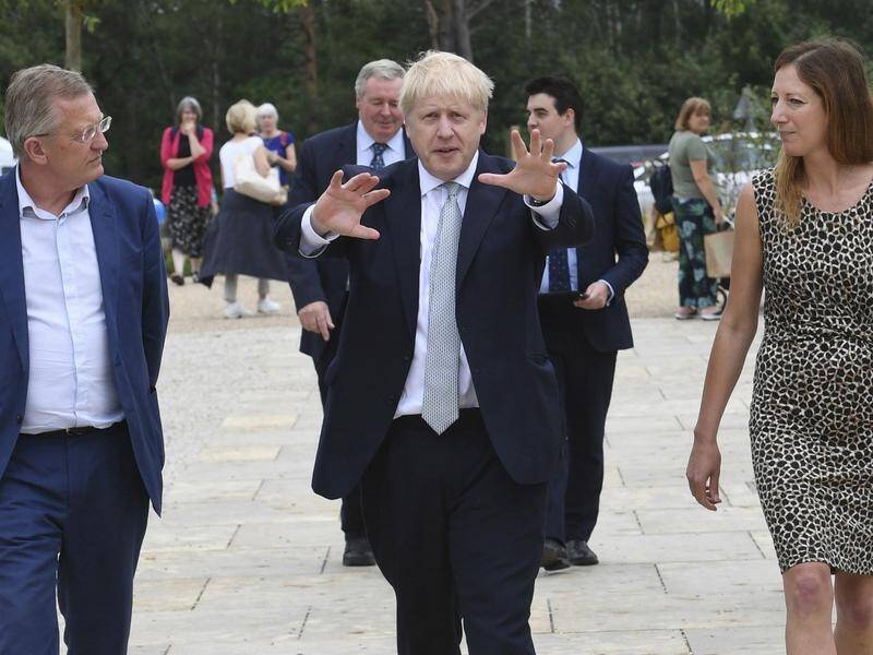 Boris Johnson (C), front runner to lead the Tory party, has sought to focus attention on Brexit.