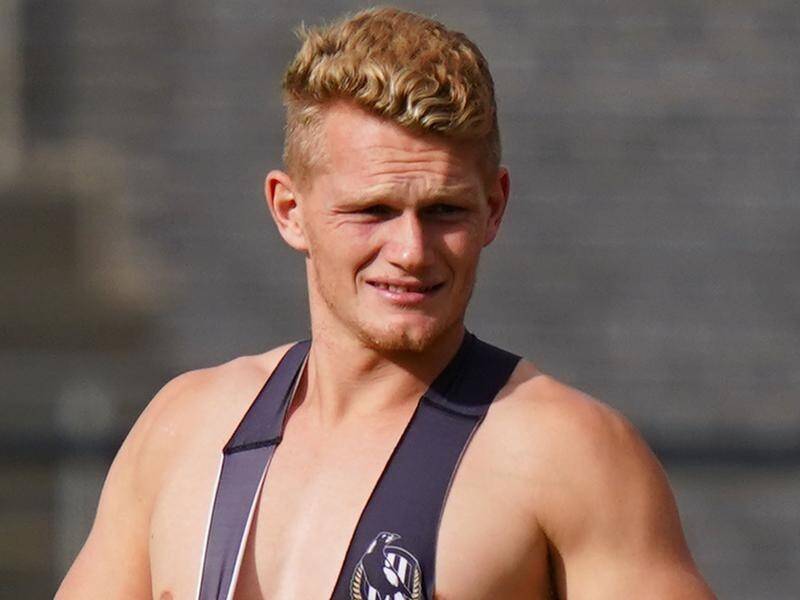 Adam Treloar could miss Collingwood's AFL round two game due to a calf injury.