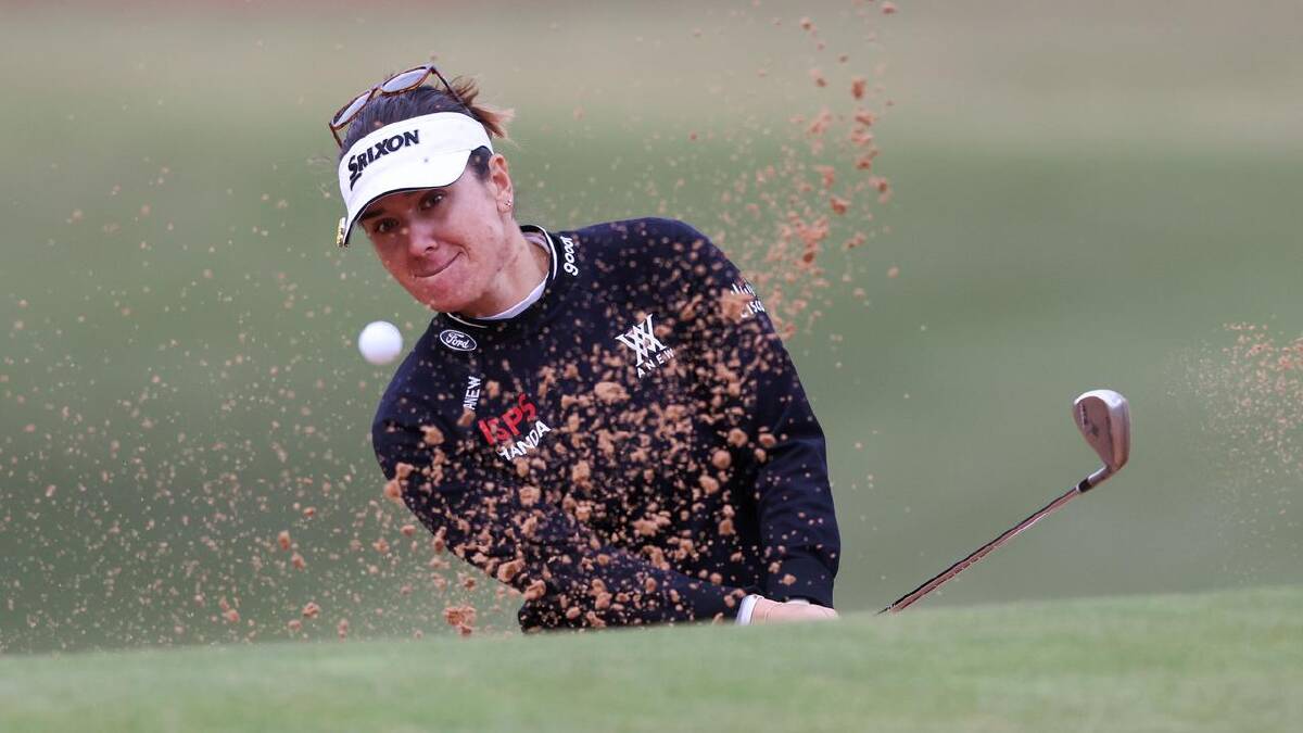 Hannah Green splashes out of a bunker during round one at Kooyonga. (Matt Turner/AAP PHOTOS)