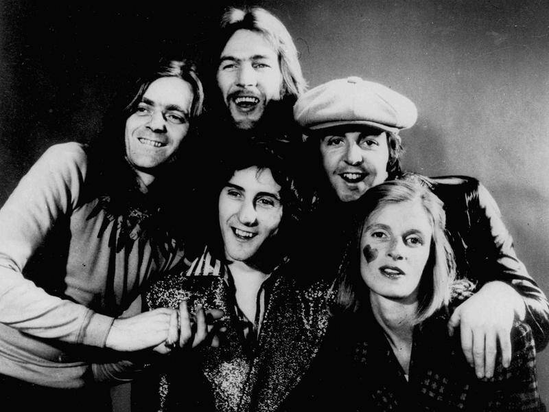 Denny Laine (front and centre) co-founded Wings with Paul and Linda McCartney. (AP PHOTO)