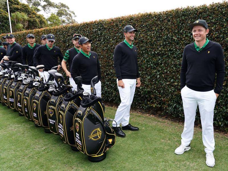 The International team line up for their photos before the Presidents Cup at Royal Melbourne.