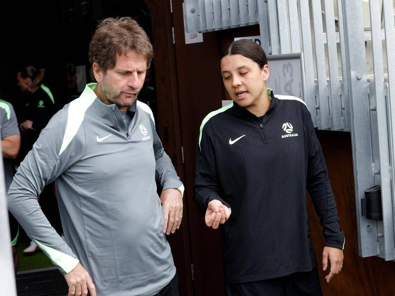 Matildas captain Sam Kerr and coach Joe Montemurro in discussion ahead of the North Korea clash. Photo: Richard Wainwright/AAP PHOTOS