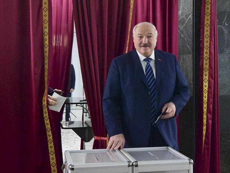 President Alexander Lukashenko casts his ballot during the Belarusian parliamentary elections. (EPA PHOTO)