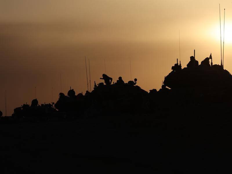Israel says it has surrounded southern Gaza's main city Khan Younis after a day of intense fighting. (EPA PHOTO)