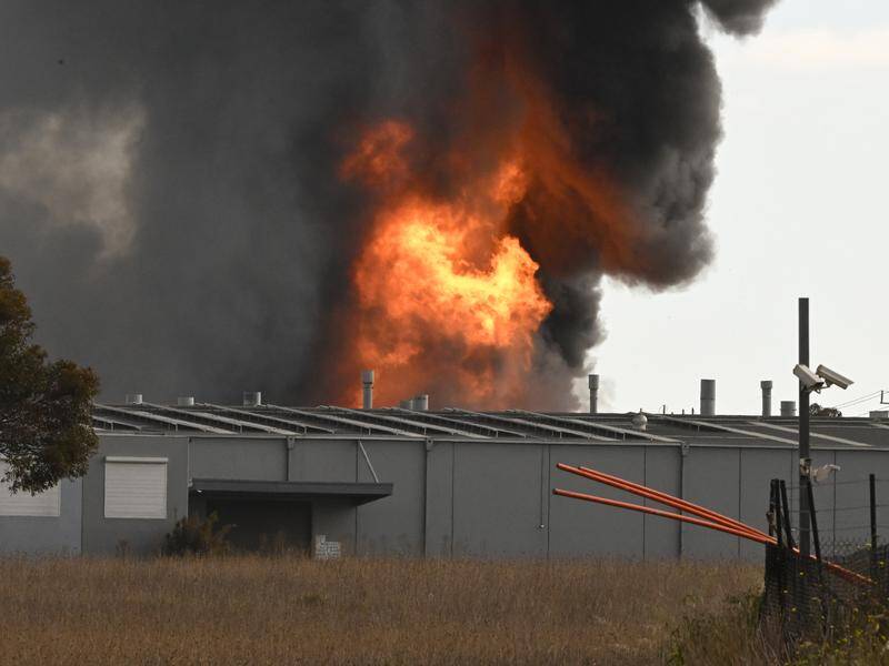 A chemical company faces multiple charges over a blaze which destroyed a factory. Photo: James Ross/AAP PHOTOS