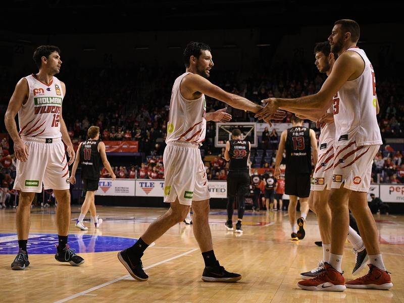 Perth celebrate levelling their NBL finals series with a road win over the Illawarra Hawks.
