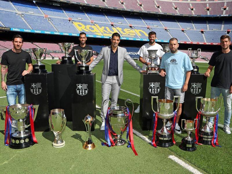 Lionel Messi (l) was among the Barcelona players at Luis Suarez's (3rd l) official club farewell.