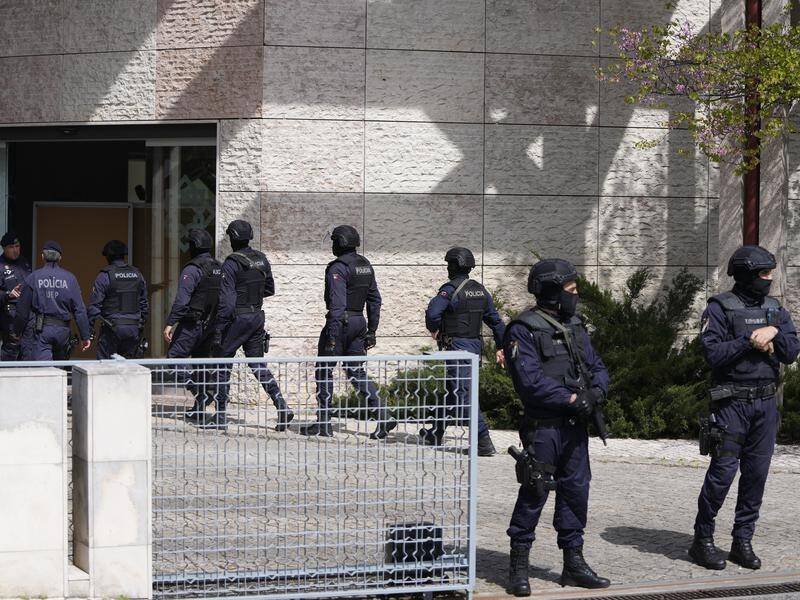 Portuguese police have shot a man suspected of stabbing two women to death at an Ismaili centre. (AP PHOTO)