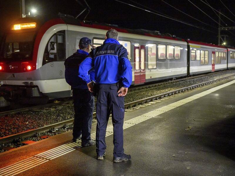 Swiss police have shot and killed a man who took hostages on a train. (AP PHOTO)